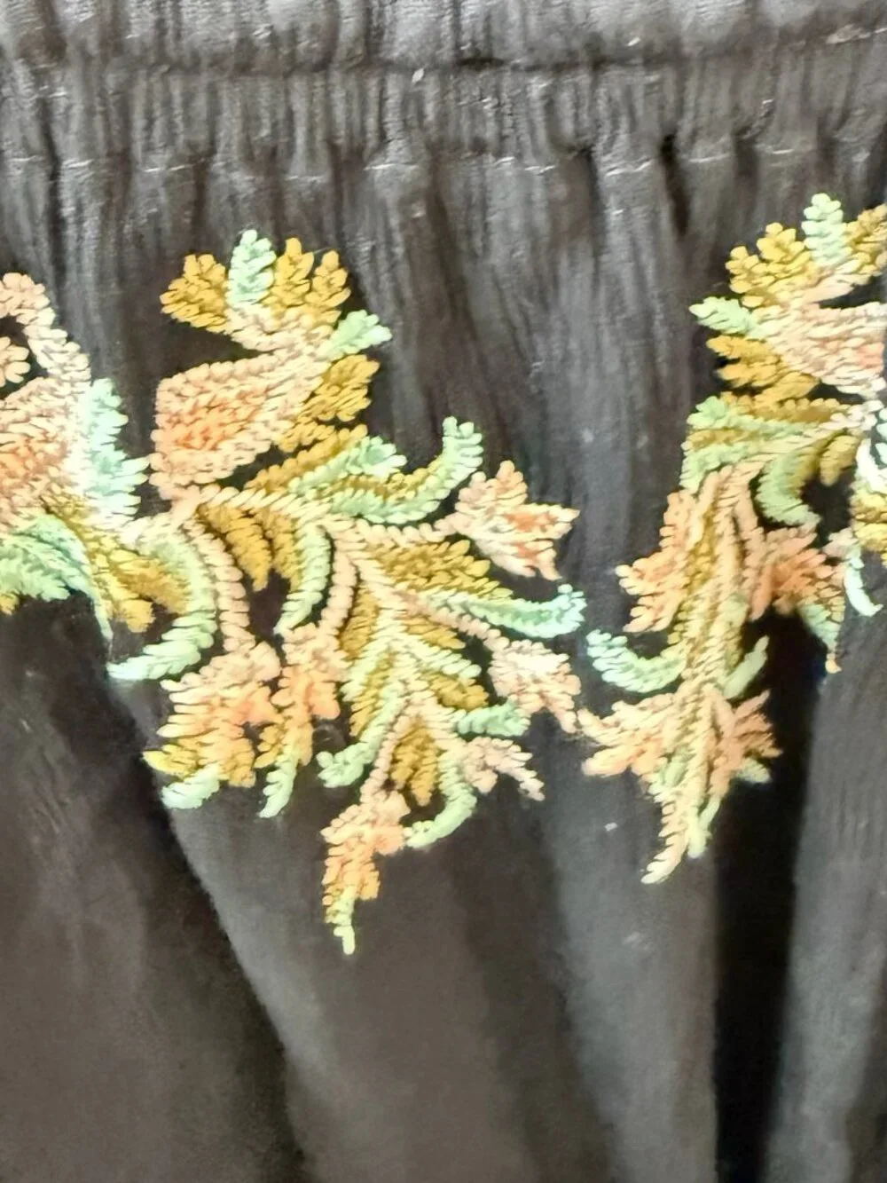 Free People Black Embroidered V-Neck Romper with Pastel Floral Detail